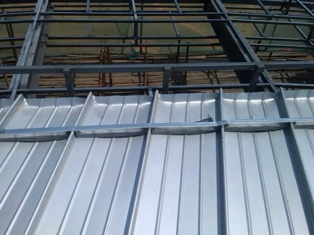 Galvanized ribbed steel roof panel